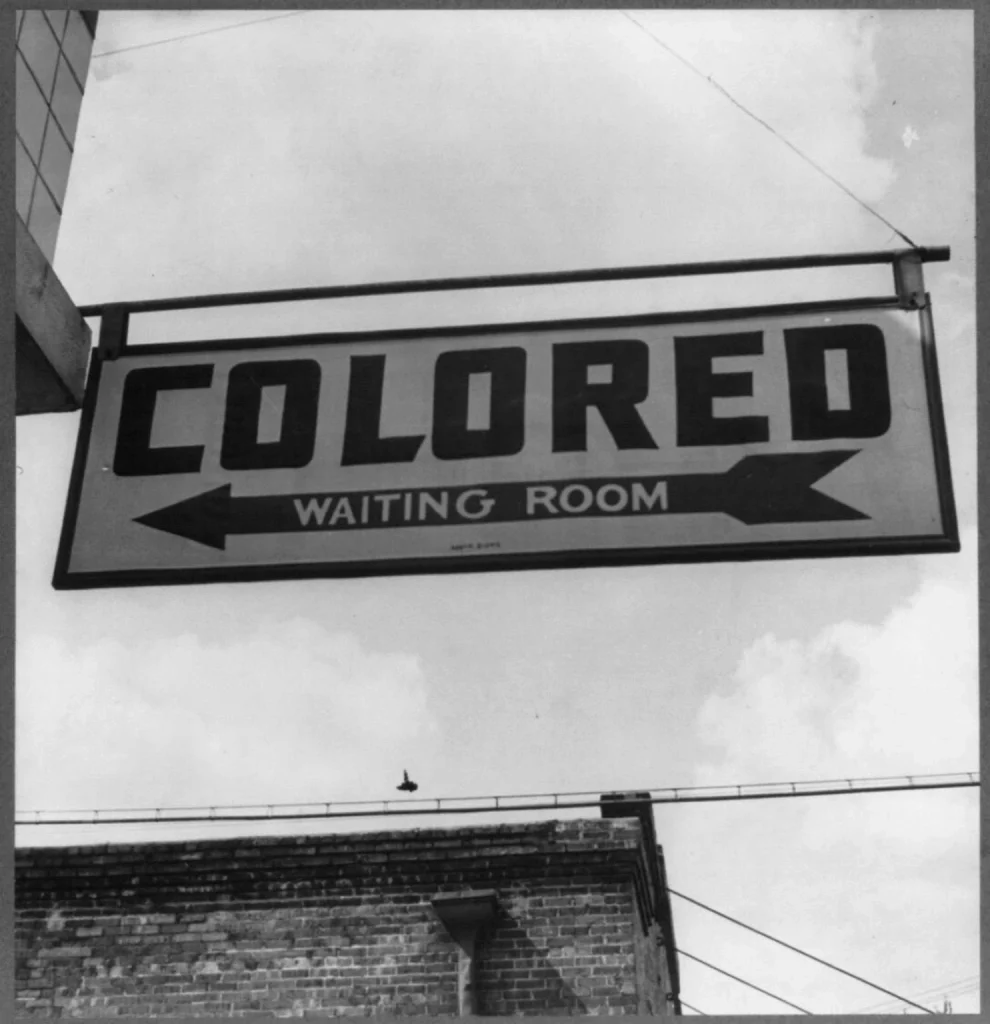 Visitors explore slavery and segregation exhibits at the National Museum of African American History and Culture